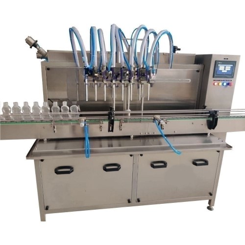 AUTOMATIC SERVO BASED LIQUID FILLING MACHINE